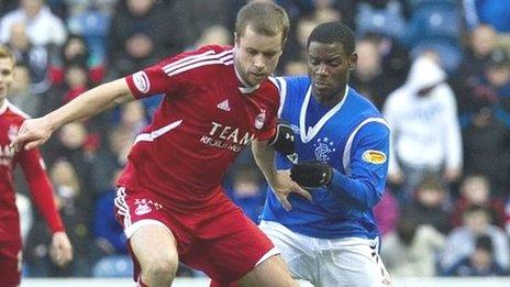 Aberdeen's Kari Arnason and Rangers Maurice Edu