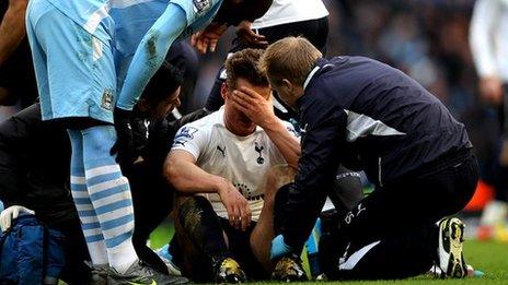 Mario Balotelli with Scott Parker