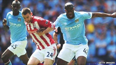 Stoke City's Rory Delap challenges Manchester City's Yaya Toure in the 2011 FA Cup final at Wembley