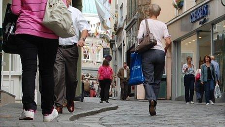 People walking in Guernsey's St Peter Port High Street