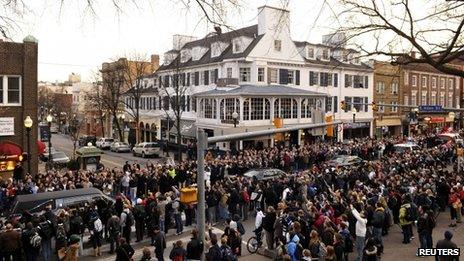 Joe Paterno's hearse passes through downtown State College, Pennsylvania on 25 January 2012