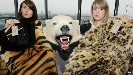 World Society for the Protection of Animals, campaign fund raisers, Margaret Balaskas, holding a Tiger skin coat and Anna Reaich, holding a Snow Leopard coat with the head and skin of a Polar Bear during a photocall