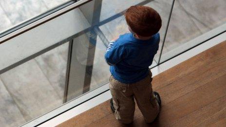 Child at window