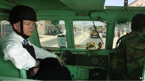 British Foreign Secretary William Hague drives through Mogadishu, Somalia, in a Kasspir armoured vehicle driven by Amisom troops in a visit to the war-torn country