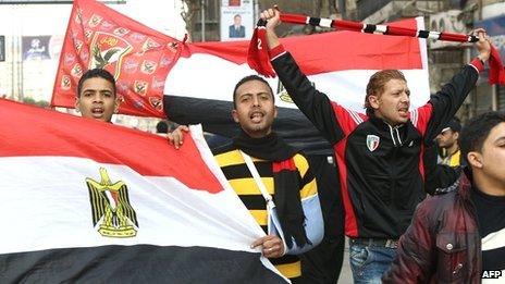 Al-Ahly fans take part in a demonstration in Cairo