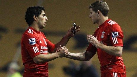 Luis Suarez (left) has not played for Liverpool since 30 December