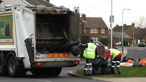 Bin men collecting rubbish in Rainham, Essex