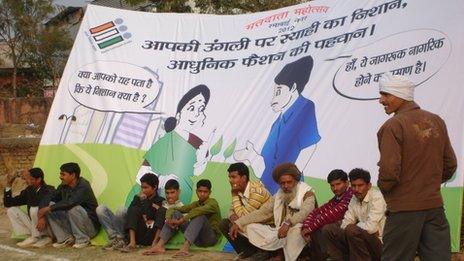 Watching a cricket match on voter awareness in Pokhraya village, Ramabai Nagar district, Uttar Pradesh