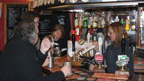 At the bar of the Fox and Goose