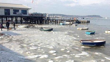 A view of Brownsea, Dorset, with the sea frozen