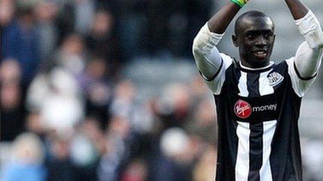 Newcastle United's Papiss Demba Cisse gestures to the fans at the end of the match