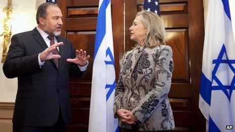 Israeli Minister of Foreign Affairs Avigdor Lieberman and US Secretary of State Hillary Clinton talk before a meeting 7 February 2012 in Washington DC