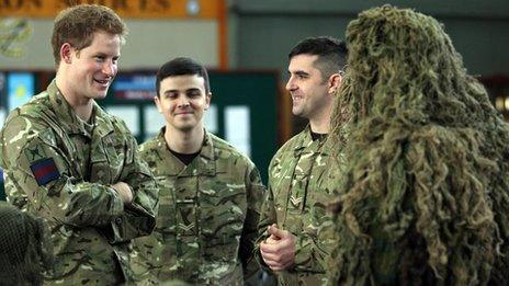 Prince Harry chats with service personnel at RAF Honington