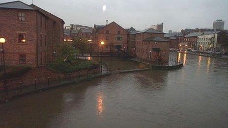 A full River Aire in Leeds city centre