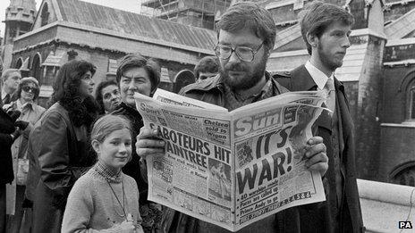 A man reading the Sun in 1982