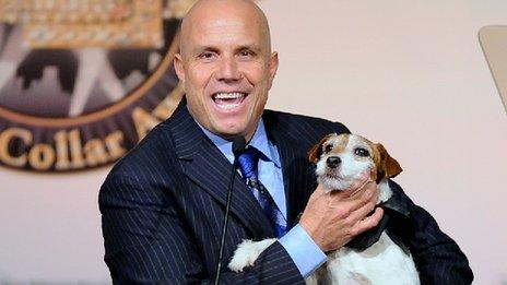 Trainer Omar Von Muller with Uggie