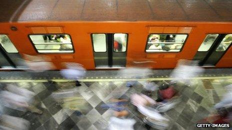 Commuters in Mexico City subway