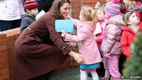 The Duchess of Cambridge greets a young girl as she visits Alder Hey Children's NHS Foundation Trust in Liverpool