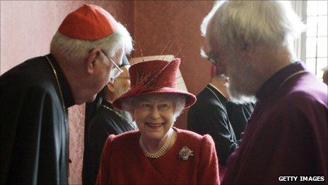 The Queen speaks to the Archbishop of Canterbury Dr Rowan Williams, pictured right, and the Catholic Church's Cardinal Cormac Murphy-O'Connor