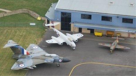 Aircraft outside hangar at Gloucestershire Airport