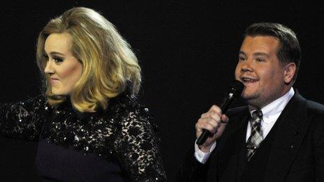 Adele with host James Corden at the Brit Awards