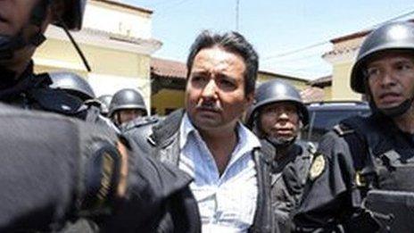 Drug suspect Juan Ortiz Lopez is escorted by police in Guatemala - file photo