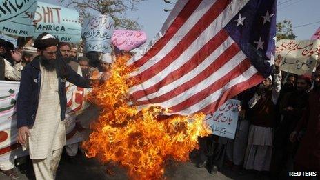 Members of a religious group at an anti-American rally in Lahore, Pakistan express anger at the burning of the Koran, 21 February 2012