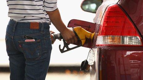 Person filling up car