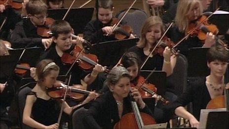 Beth Rose (centre, right) playing in the concert