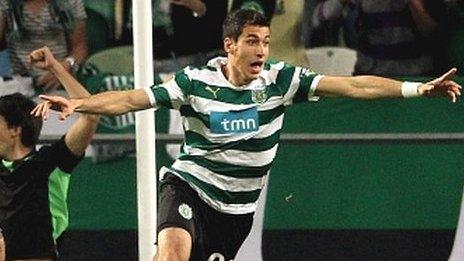 Xandao of Sporting Lisbon (right) celebrates after scoring