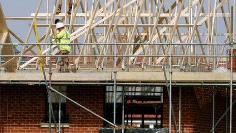 Builders working on a new house