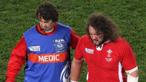 Adam Jones and Wales physio Mark Davies