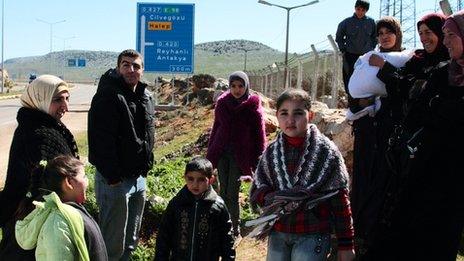 Syrian refugees outside their camp in Reyhanli, Turkey, on 4 March 2012