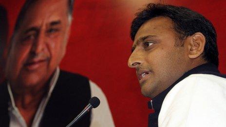 Akhilesh Yadav with a poster of father Mulayam Singh