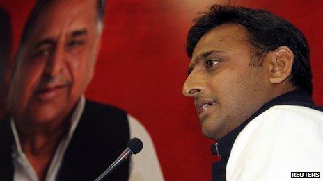 Akhilesh Yadav with a poster of father Mulayam Singh