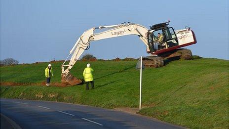 Work begins on removing soil from the bund outside Guernsey Airport