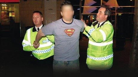 A man being arrested by police