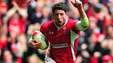 Wales Alex Cuthbert wing on his way to scoring a try