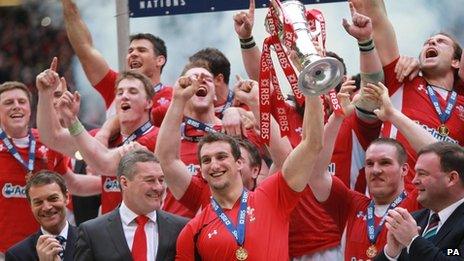 Wales celebrate the Grand Slam with the Six Nations trophy