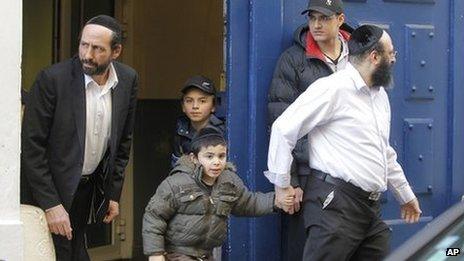 French schoolchildren leave a Jewish school in Paris on 19 March, a day after the shootings at a Jewish school in Toulouse