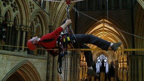 Jonathan Foyle suspended inside Lincoln Cathedral