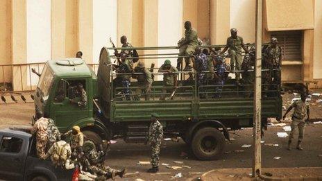 Malian soldiers outside the state TV in Bamako. Photo: 22 March 2012