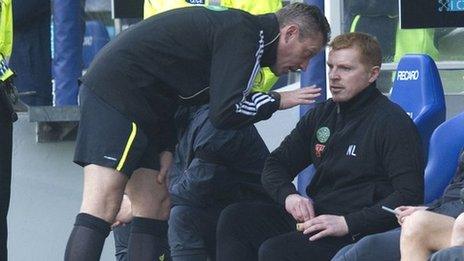 Fourth official Iain Brines has a word with Celtic manager Neil Lennon