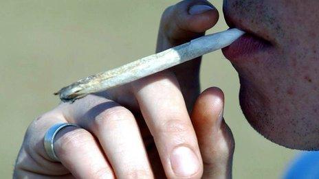 Man smoking a cannabis joint