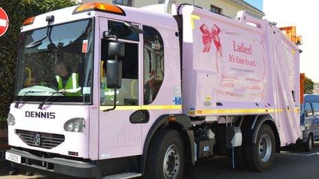 Pink refuse truck in St Helier