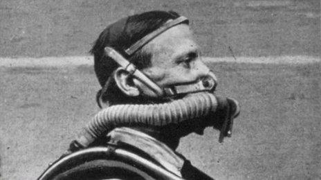 Miner with breathing apparatus