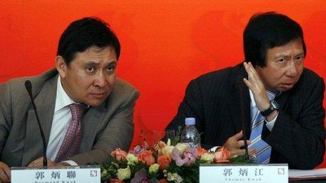 Thomas (R) and Raymond Kwok in 2009