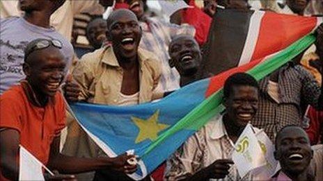 South Sudanese fans cheer their national team's first match in a friendly against Kenya side Tusker to celebrate independence last July