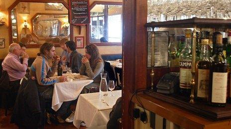 Diners at a bistro table