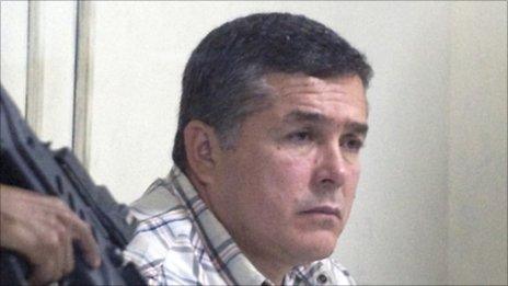 Alleged Guatemalan drug trafficker Horst Walther Overdick under armed guard in Guatemala City.